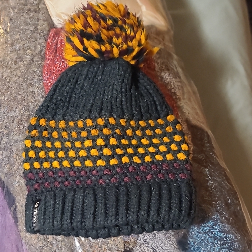 Arc'teryx Dark Knit Beanie with Maroon Accents